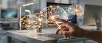 Hand touching glowing brain network connections representing artificial intelligence and neural networks in modern office workspace for technology concepts.