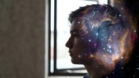 Young man in profile with cosmic galaxy overlay representing imagination, creativity and infinite possibilities in modern interior setting.