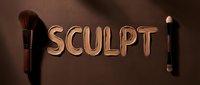 Makeup brushes and sculpting tools arranged beside embossed text on brown background for cosmetic artistry and beauty design projects.