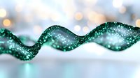 Elegant emerald green spiral ribbon with glitter sparkles against blurred bokeh lights background, creating magical festive atmosphere for holiday designs.