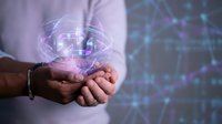 Man holding glowing digital sphere with network connections, representing technology, data transfer, and global communication in business and innovation.