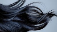 Flowing dark hair with purple highlights in motion against light background showcasing natural movement and shine for beauty and haircare concepts.