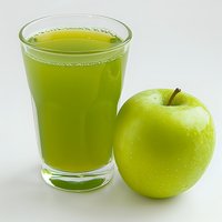 Fresh green apple juice in clear glass with whole green apple on white background, healthy natural beverage for detox and wellness lifestyle.