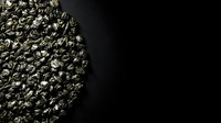 Roasted coffee beans arranged in circular formation on dark background, suitable for beverage packaging, cafe branding, and coffee product marketing materials.