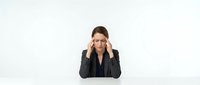 Professional businesswoman experiencing headache stress at workplace holding temples with hands isolated on white background for corporate wellness concepts.
