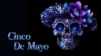 Ornate sugar skull decorated with purple flowers and jewels for Cinco de Mayo celebration on dark background with festive text.