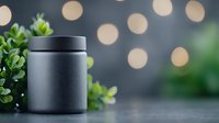 Minimalist black cosmetic jar on dark surface with bokeh lights and green leaves, elegant product photography setup for beauty and skincare marketing.