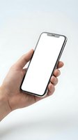 Hand holding modern smartphone with blank white screen mockup for app presentation and mobile interface design on neutral background.