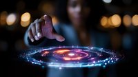 Businessman hand touching futuristic holographic interface with glowing circular display and digital particles in modern office environment.