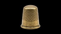 Brass sewing thimble with textured dimple pattern, isolated on transparent background. Ready for clipart, print-on-demand, sublimation, t-shirt design, and craft projects.