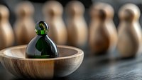 Green bowling ball in wooden bowl with blurred pins background for sports equipment and recreation concept.