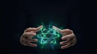 Hands protecting glowing green network sphere with digital connections on dark background representing cybersecurity and data protection concepts.