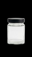 Empty glass jar with black screw-on lid, isolated on transparent background. Ready for design use on product labels, packaging mockups, clipart, print-on-demand items, and sublimation projects.