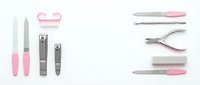Professional manicure pedicure tools set with pink handles isolated on white background for nail care salon beauty treatment and personal grooming.