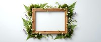 Wooden frame decorated with fresh green ferns, lavender flowers and foliage on white background, suitable for wedding invitations, greeting cards and botanical design projects.