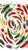 Colorful variety of fresh chili peppers arranged in a spiral pattern on white background, showcasing red, green, yellow, and purple hot peppers.