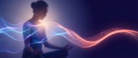 Young man with dark hair and medium skin tone, seated in profile, surrounded by glowing blue and orange energy waves. Suitable for technology, innovation, creativity, and digital transformation concepts.