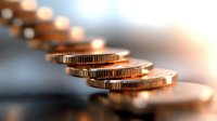 Stacked copper coins in diagonal line with soft focus and bokeh effect creating depth perspective, symbolizing financial growth and wealth management.