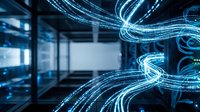 Digital data streams flowing through modern server room with glowing blue light trails representing network connectivity and information transfer in technology center.