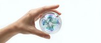 Human hand protecting Earth globe with green continents showing environmental conservation and sustainability concept on white background.