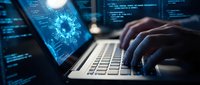 Cybersecurity concept with hands typing on laptop displaying digital eye symbol and code on screen representing data protection and online security.