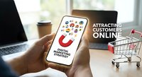 Digital marketing strategy concept with magnet attracting customers online through mobile device for business growth and e-commerce success.