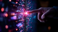 Hand pointing at glowing digital data stream with pink and blue light effects, representing technological advancement and digital transformation in modern business.