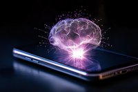 Glowing purple brain hologram emerging from smartphone screen with neural network connections and particles, symbolizing artificial intelligence and digital mind.