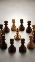 Golden chess pawn stands out among wooden pieces on neutral background representing leadership, strategy, and standing out from the crowd in business concepts.