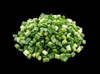 Chopped fresh green onions pile isolated on transparent background, ready for food design, menus, stickers, print on demand, and culinary clipart projects.