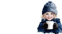 Young Caucasian child wearing blue winter coat and knit hat holds white mug with warm drink, smiling brightly against white background. Cozy winter lifestyle portrait.
