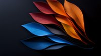 Vibrant paper leaves in orange, blue, and burgundy colors arranged artistically on dark background creating dynamic composition with dramatic lighting and shadows.