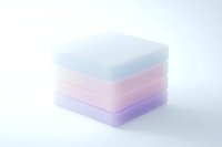 Soft pastel colored layers stacked in gentle gradient from blue to pink to purple, creating minimalist geometric composition against white background.
