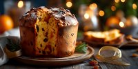 Traditional Italian panettone Christmas bread with candied fruits and raisins on wooden plate with festive bokeh lights background for holiday baking celebrations.