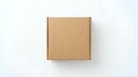 Closed kraft cardboard box with brown tape on white background, ready for shipping, packaging design, and e-commerce mockups.