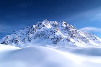 Majestic snow-covered mountain peak rising above pristine white drifts under deep blue winter sky, capturing serene alpine wilderness landscape.