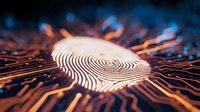 Digital fingerprint glowing on circuit board with orange light trails representing cybersecurity, biometric authentication and data protection technology.