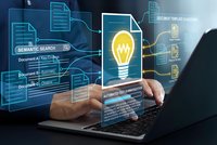 Business professional using laptop with digital innovation interface featuring glowing lightbulb and document management system for creative solutions.