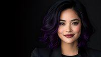 Young Asian woman with purple ombre hair and burgundy lipstick smiling confidently against dark background, wearing black top, modern beauty portrait with dramatic lighting.