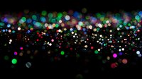 Colorful defocused bokeh lights scattered against dark background create magical nighttime atmosphere, suitable for festive designs and holiday backgrounds.