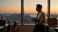 Professional businessman contemplating city skyline at sunset from modern office window, corporate success and urban lifestyle concept.