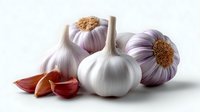 Fresh whole garlic bulbs and peeled cloves arranged on white background, soft lighting creates gentle shadows highlighting natural texture and purple tints.