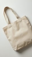 Beige cotton tote bag with long handles isolated on white background, ready for branding, printing, or design customization for retail and promotional use.