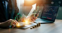 Business professional analyzing financial data with smartphone and laptop showing trading charts, growth arrow overlay symbolizing investment success and market analysis.