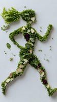Running figure made from fresh kale leaves, spinach, and mixed vegetables arranged on white background, representing healthy lifestyle and fitness nutrition.