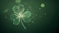 Magical glowing shamrock with sparkles and bokeh effects on dark green background, symbol of Irish luck and Saint Patrick's Day celebrations.
