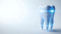 Digital tooth with glowing blue technology overlay and circuit patterns on clean white background for dental healthcare and medical innovation concepts.