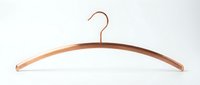 Elegant copper-toned wooden clothes hanger isolated on white background, perfect for fashion retail, wardrobe organization, and clothing display concepts.