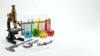 Vintage brass microscope with colorful test tubes and laboratory equipment for scientific research and education on white background.