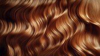 Luxurious wavy auburn hair with golden highlights showcasing natural shine and texture. Perfect for beauty, fashion, and hair care advertising.